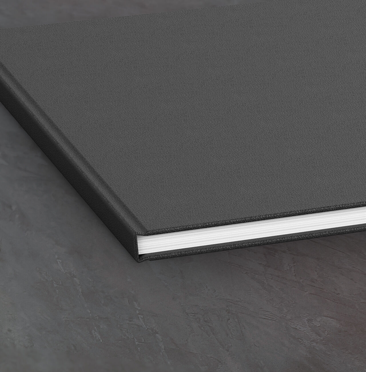 Zwart fotoboek met witte rand, op een eenvoudige ondergrond