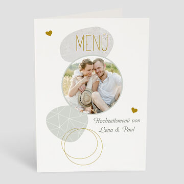 Huwelijksmenu met de namen Lena en Paul op een elegante kaart.