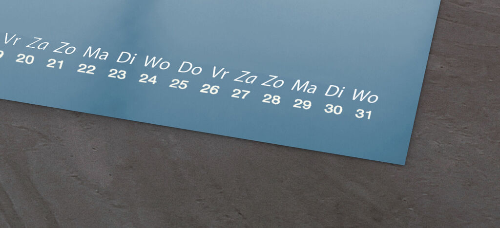 Kalenderpagina voor december met blauwe datumnummers.