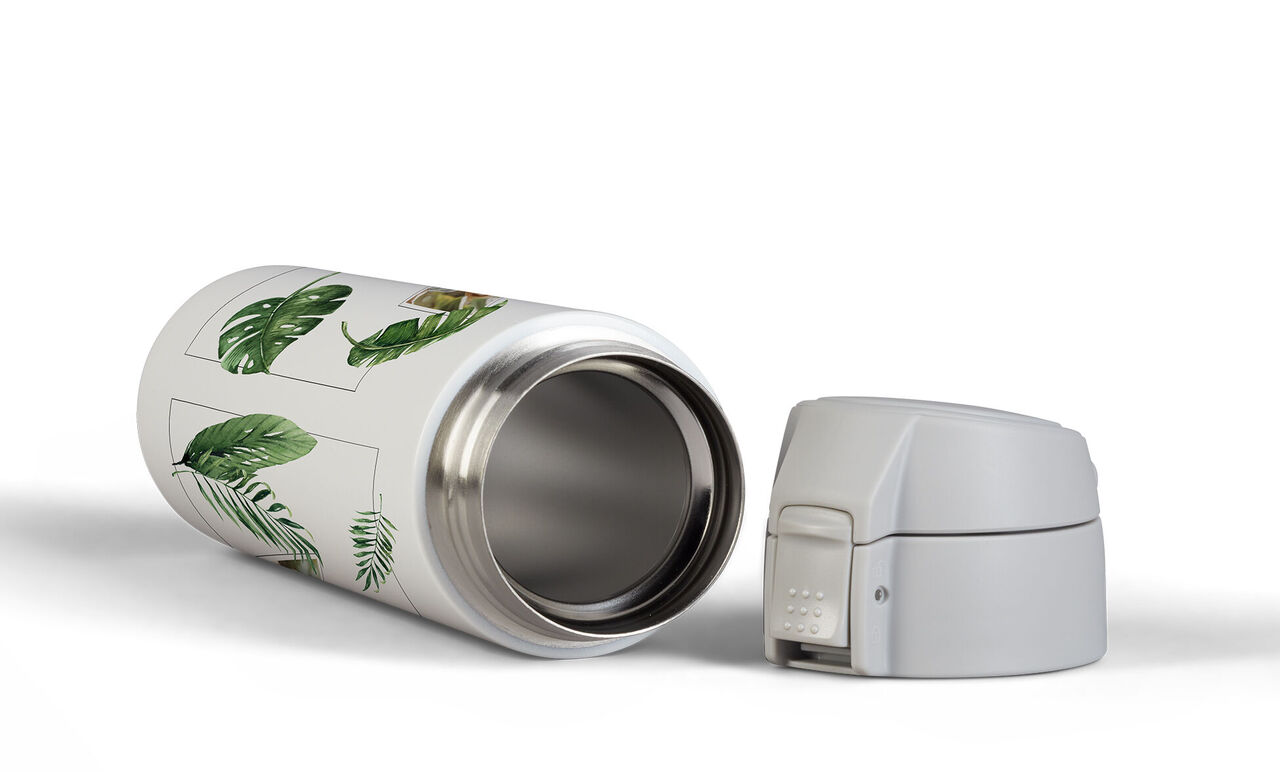 Hergebruikbare thermosfles met groen bladdesign en een witte dop