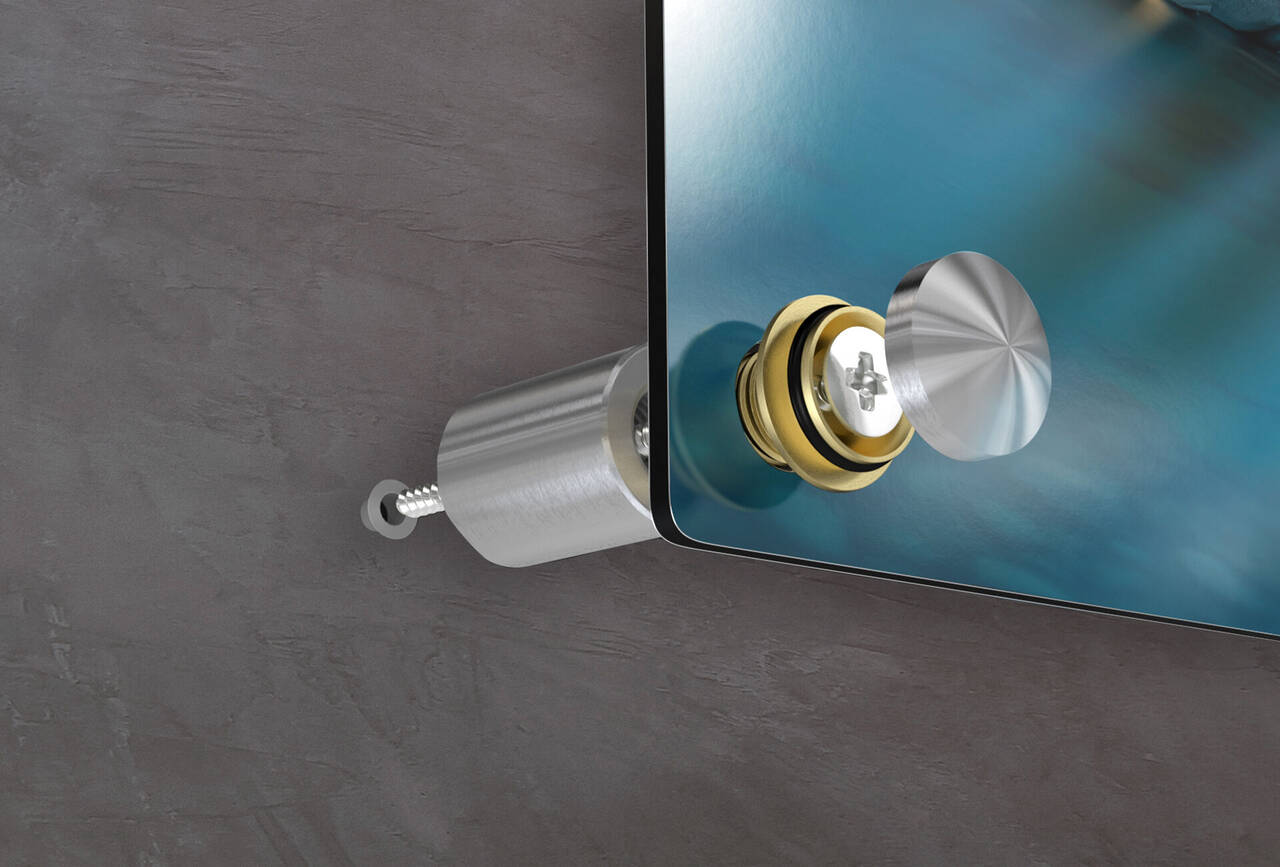 Detailfoto van een sterke wandbeugel voor een glazen paneel, gebruikt in een moderne ruimte